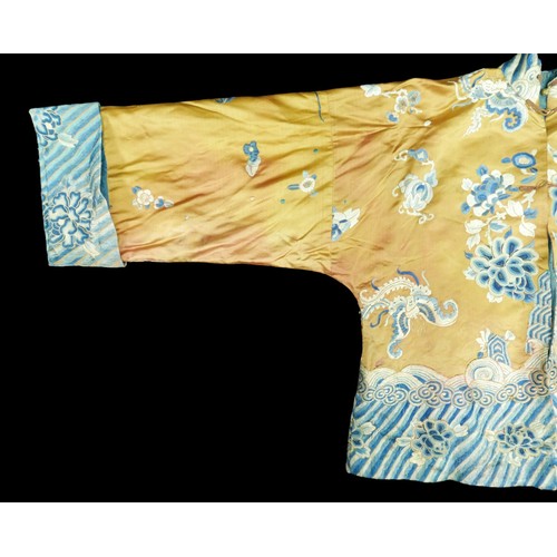 293 - An early 20th century Japanese jacket, decorated with blue chrysanthemums and butterflies on a gold ... 