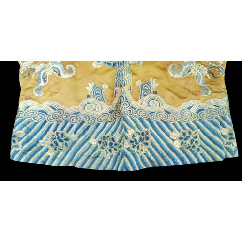 293 - An early 20th century Japanese jacket, decorated with blue chrysanthemums and butterflies on a gold ... 