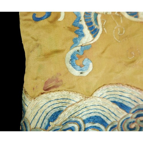 293 - An early 20th century Japanese jacket, decorated with blue chrysanthemums and butterflies on a gold ... 