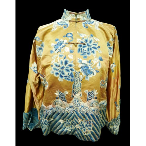 293 - An early 20th century Japanese jacket, decorated with blue chrysanthemums and butterflies on a gold ... 