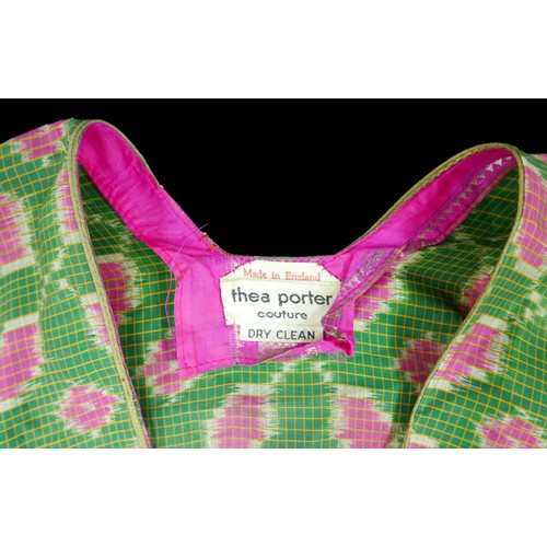 305 - A 1970s Thea Porter Couture kaftan, made of various green, pink, red and purple ground panels, adorn... 