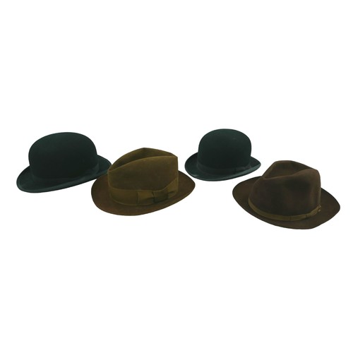 297 - Four vintage hats, comprising, two Lock & Co. bowler hats, one with a Lock & Co. hat box, both appro... 