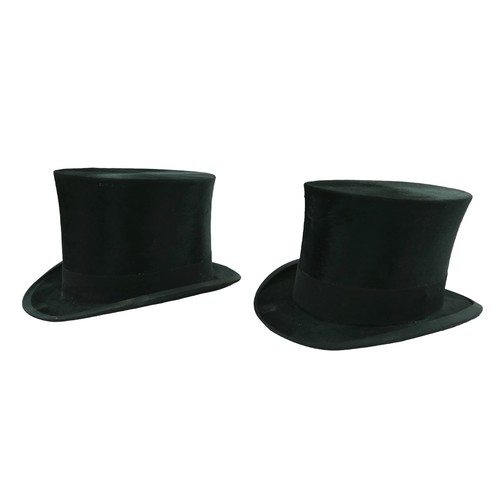 300 - Two vintage top hats, comprising  a Henry Heath hat, inner radius approximately 56cm, with fitted le... 