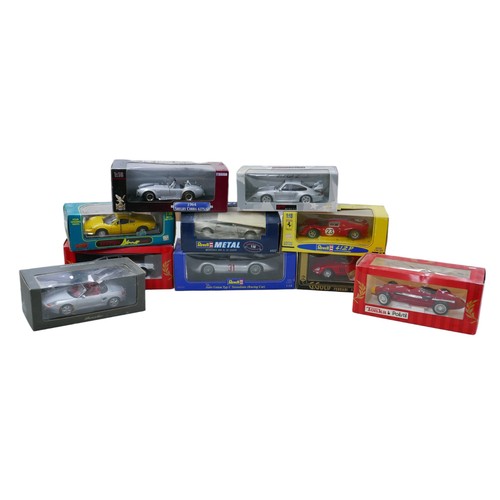 273 - Eight 1/18 scale die-cast model sports cars, including eight 1/18 scale models, a Revell 'Jouefevolu... 