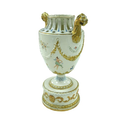 75 - A GB Nove style twin handled vase, with lions head mount handles, pierced decoration to its top, han... 