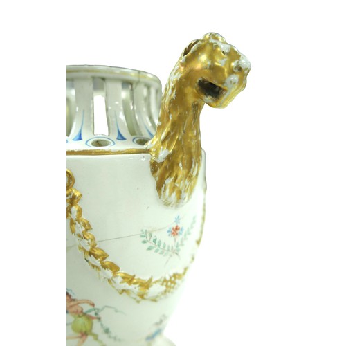 75 - A GB Nove style twin handled vase, with lions head mount handles, pierced decoration to its top, han... 