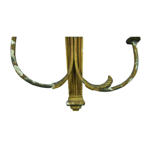 354 - Three 19th century giltwood and gesso wall sconces, each eagle surmounts, one with a ball and chain ... 