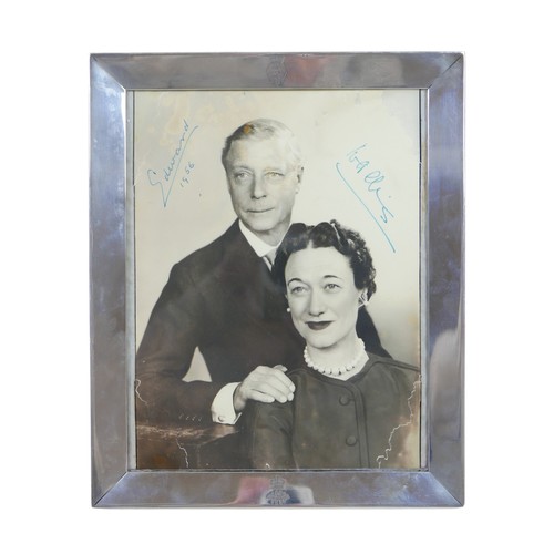 Edward, Duke of Windsor (1894-1972) and Wallis, Duchess of Windsor (1895-1986) autographed photograph portrait by Dorothy Wilding, signed by both sitters and dated '1956', also signed by the photographer and bearing a studio label verso, numbered '3259 A', image size 23 by 17.5cm, mounted within a silver Cartier frame with the late Duke's crest, 27.5 by 22.7cm overall.

Provenance: Privately owned, Clipsham House, Lincolnshire, believed to have been a gift to Leonora Corbett, an English actress, who was also the mistress of Egmont van Zuylen van Nyevelt (of the Rothschild family). Corbett was socialised with a range of celebrities from George Bernard Shaw Vivien Leigh. The photograph was possibly given to Corbett in Paris or New York. Corbett owned an apartment at the Waldorf Astoria (she later rented it to Marilyn Monroe).