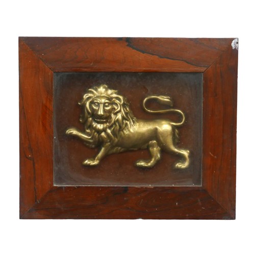 146 - A 19th century gilt metal relief plaque of a lion, lion 14 by 22cm, mounted, glazed and in a rosewoo... 