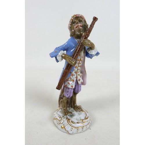 105 - Two 19th century Meissen figurines, modelled as a trumpeter and an oboist from the Monkey Band serie... 