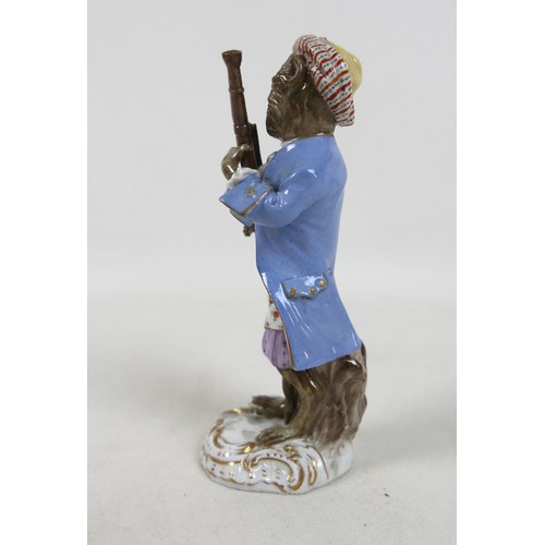 105 - Two 19th century Meissen figurines, modelled as a trumpeter and an oboist from the Monkey Band serie... 