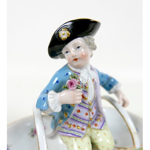 106 - A group of four 19th century Meissen salts, modelled as figures in 18th century attire sitting on tw... 