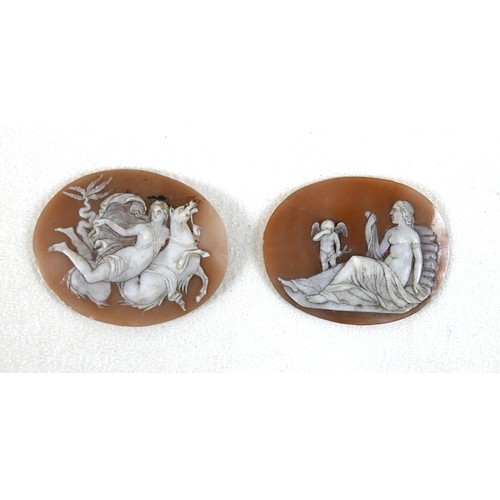 158 - Two 19th century cameos, each oval carved with a classical nude lady, one rising a hippocampus, the ... 