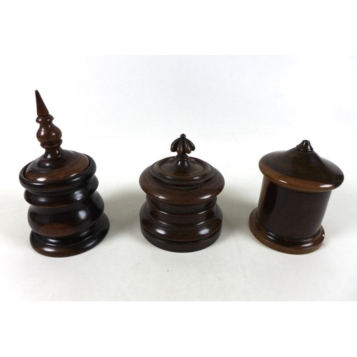 259 - Three exotic wood lidded jars including a Lignum Vitae string jar, tea caddy and tobacco jar 24cm ta... 