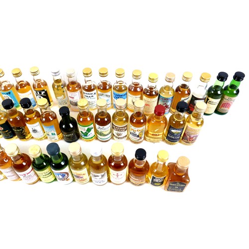 135 - A collection of whisky miniatures, mostly blended some novelty. (54)