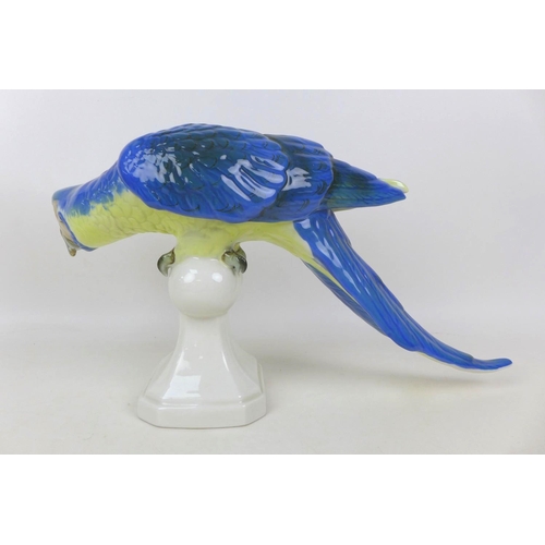 87 - A Royal Dux Bohemia porcelain parrot, with applied factory mark, printed and impressed marks to its ... 