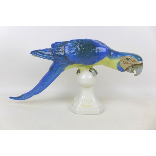 87 - A Royal Dux Bohemia porcelain parrot, with applied factory mark, printed and impressed marks to its ... 