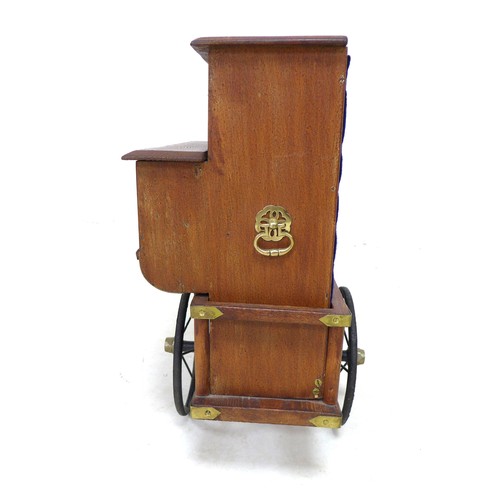 323 - A miniature Victorian style street musical organ grinder, with brass fittings, and extra musical dic... 