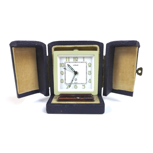 224 - A retro Jaeger LeCoultre alarm clock, with pale blue metal case, Arabic dial, 5.5 by 3.5 by 6.5cm hi... 