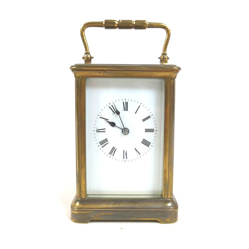 229 - A late Victorian brass carriage clock striking on a gong with leather outer case, 9 by 7 by 16cm hig... 