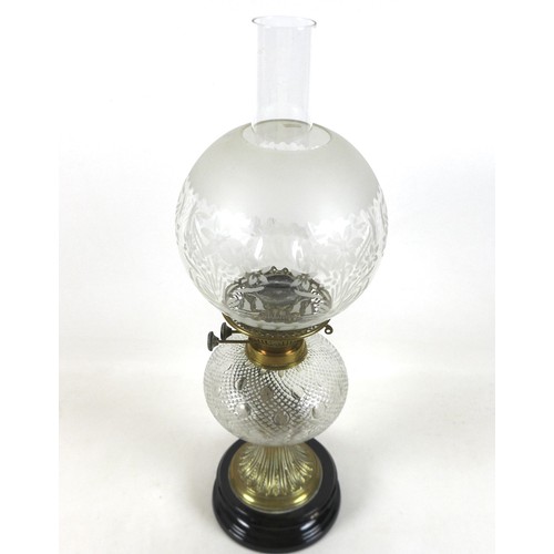 350 - A Victorian paraffin lamp, with etched glass globe shade and clear glass chimney, 17 by 58cm high.