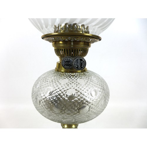 350 - A Victorian paraffin lamp, with etched glass globe shade and clear glass chimney, 17 by 58cm high.