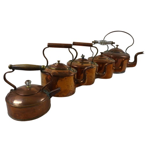 344 - A mixed group of copper and brass items comprising of a copper electric kettle, a small copper kettl... 