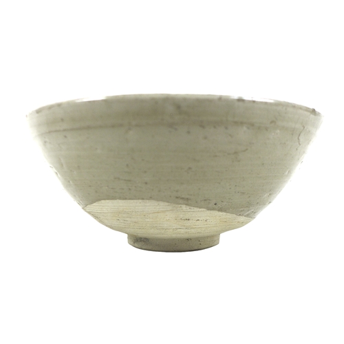 5 - A Chinese Longquan-type celadon bowl, decorated incised decoration of leaves to the inside, asymmetr... 