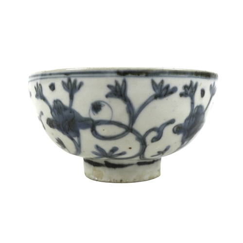 4 - A Chinese porcelain bowl, late Ming period, decorated in underglaze blue internally with four flower... 