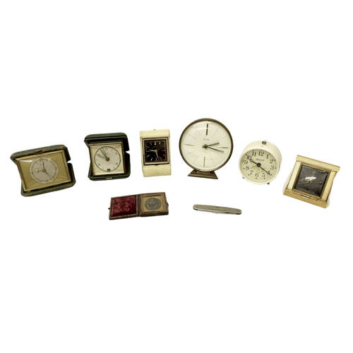 225 - A group of six vintage travel clocks, comprising a Kienzle, Andrew De Luxe, Looping, and  Seth Thoma... 