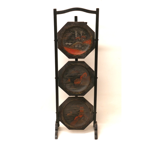 502 - An Edwardian Chinoiserie three tier folding cake stand, 27 by 22 by 79cm high.