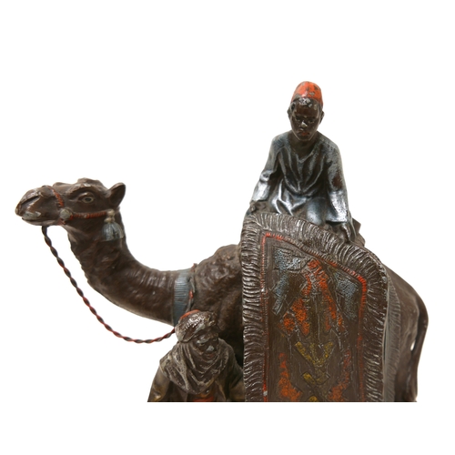 335 - A cast metal sculpture, in the style of Franz Bergmann, modelled as a Persian rug seller, with camel... 