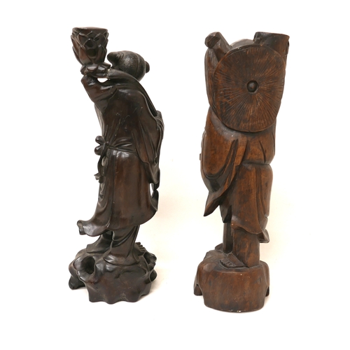 246 - Two Chinese carved wooden figures, one previously a table lamp base, both 37cm high. (2)