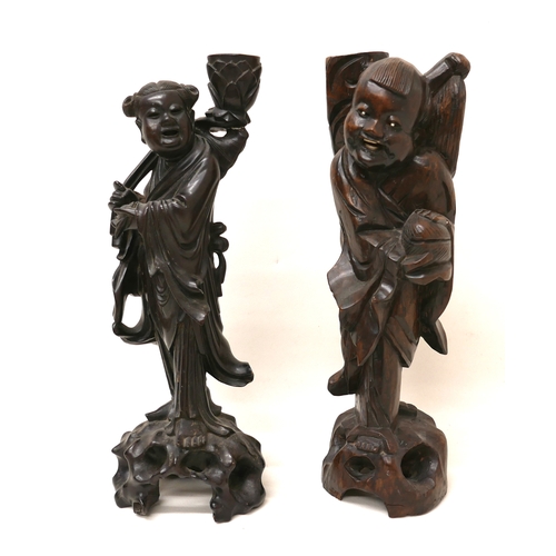 246 - Two Chinese carved wooden figures, one previously a table lamp base, both 37cm high. (2)