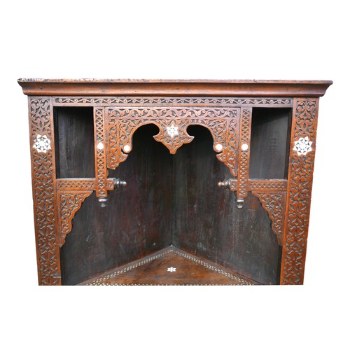 530 - A Moorish corner display unit, carved and inlaid decoration, 66 by 34 by 167cm high.