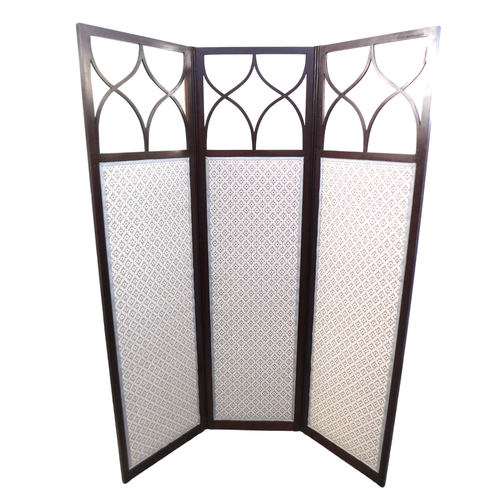 515 - An Edwardian mahogany room screen, the three panels with astragal glazed uppers and fabric panels be... 