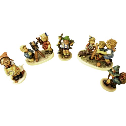 63 - A group of five large Hummel china figurines, comprising Scooter Tim, Camera Ready (1977-2002) 25 ye... 