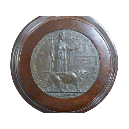 287 - A WWI death plaque, named 'George Dick Martindale' with wooden mount,  and other militaria including... 