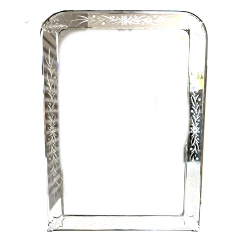 490 - A Venetian style wall mirror, with rectangular plate and engraved decoration to the outer sectional ... 