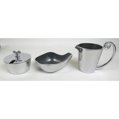 340 - A collection of Carrol Boyes designed metal table and serving ware, including bowls, dishes,  jug, w... 