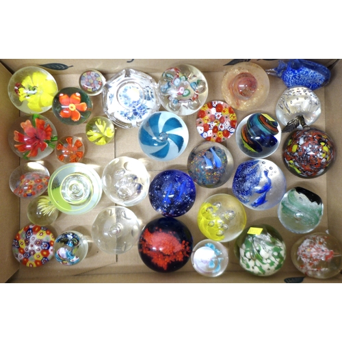 38 - A large collection of modern glass paperweights, including floral and millefiori, most unmarked. (1 ... 