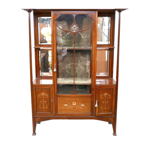 608 - An Art Nouveau mahogany display cabinet, with inlaid metal and fruitwood decoration, stepped and sha... 