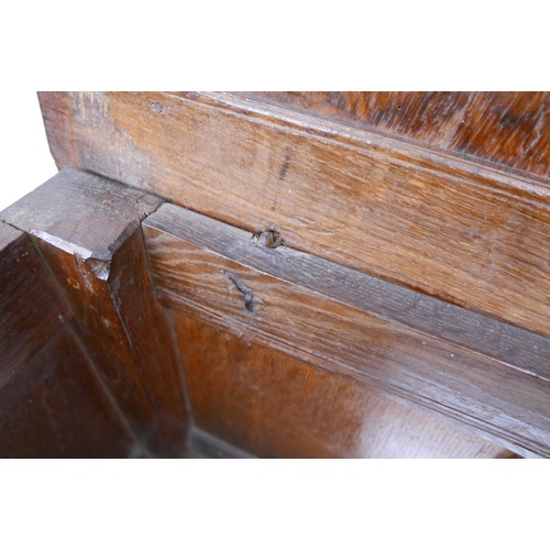 604 - A 17th century oak coffer, carved three panel front with initials 'W K' and 'E J P', and date '1661'... 