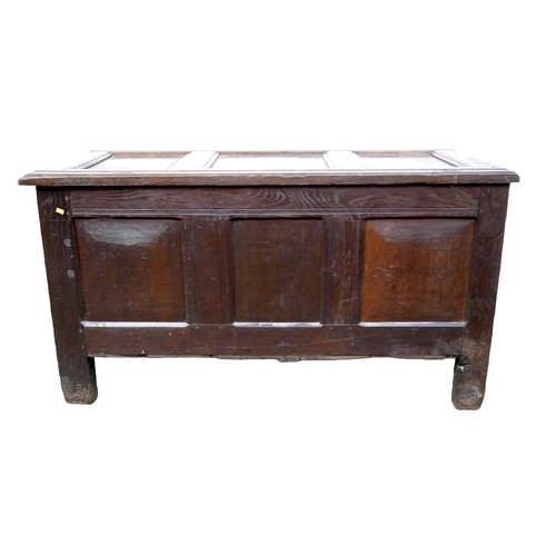 604 - A 17th century oak coffer, carved three panel front with initials 'W K' and 'E J P', and date '1661'... 