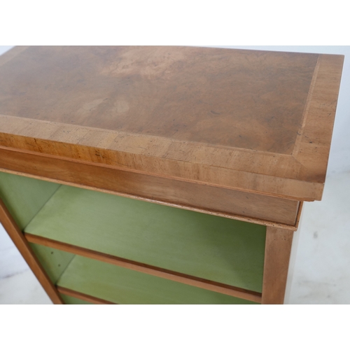 558 - A pair of new walnut freestanding bookcases, each with two shelves and painted green internally, 61 ... 