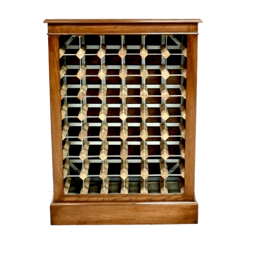 557 - A new oak wine rack, accommodating 48 bottles, plinth base, 71 by 28 by 99cm high. Made by a cabinet... 