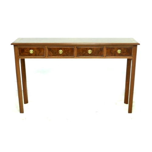 560 - A walnut hall table, with four frieze drawers and ring handles, raised on square section legs, 126 b... 