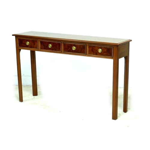 560 - A walnut hall table, with four frieze drawers and ring handles, raised on square section legs, 126 b... 