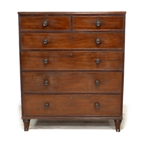 605 - A Victorian mahogany chest of two short over four long graduating drawers, with turned knobs, raised... 