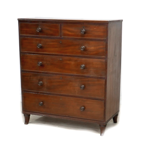 605 - A Victorian mahogany chest of two short over four long graduating drawers, with turned knobs, raised... 